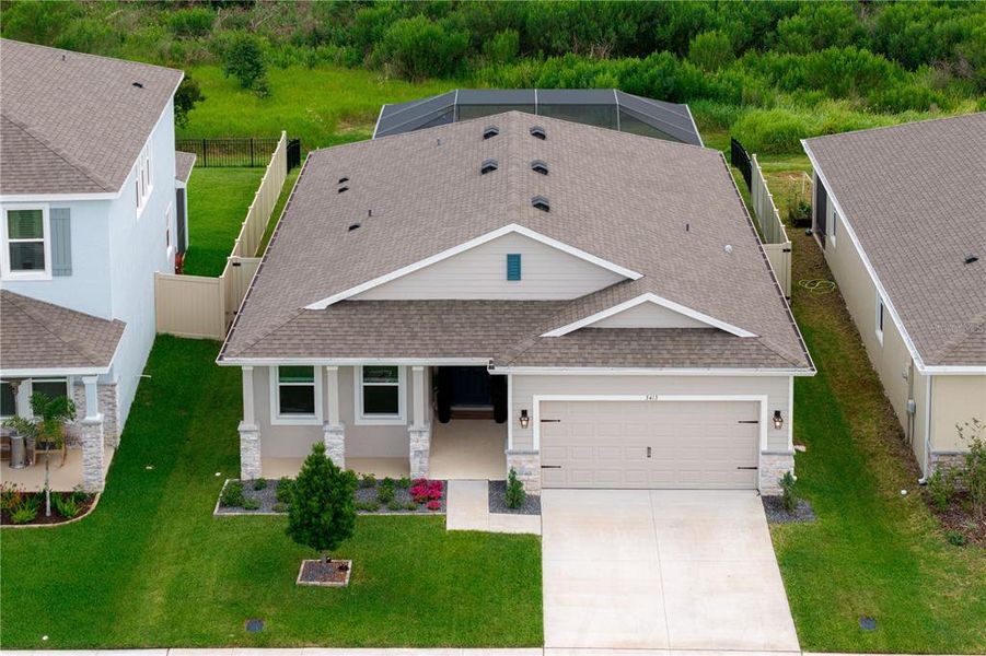 Front exterior of a new home in Farm at Varrea, Plant City, FL, highlighting curb appeal (Image 26).