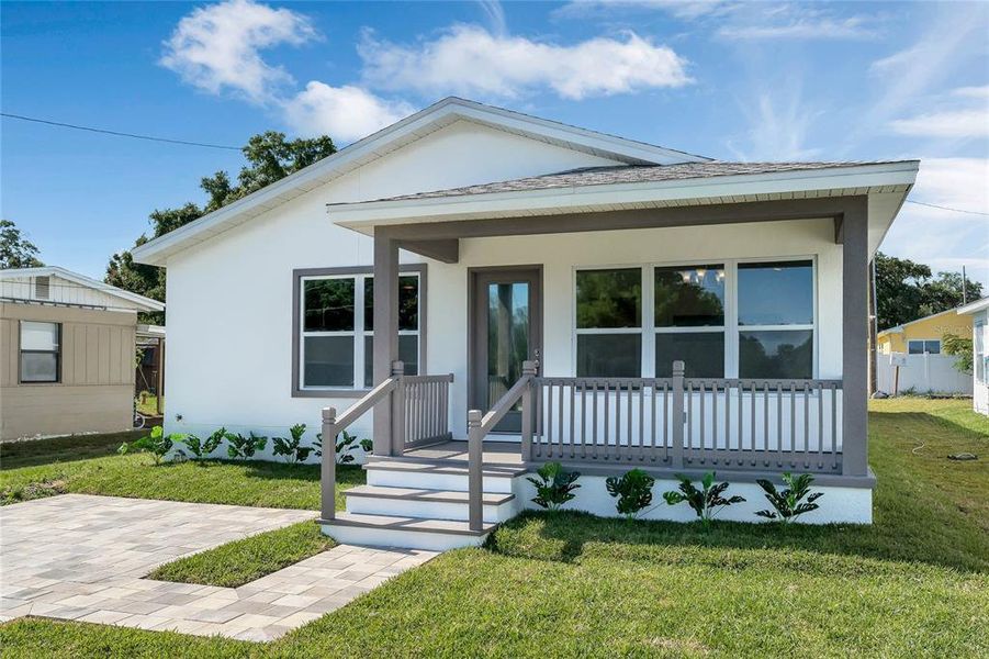 Front Of Home w/ Covered Sitting Patio