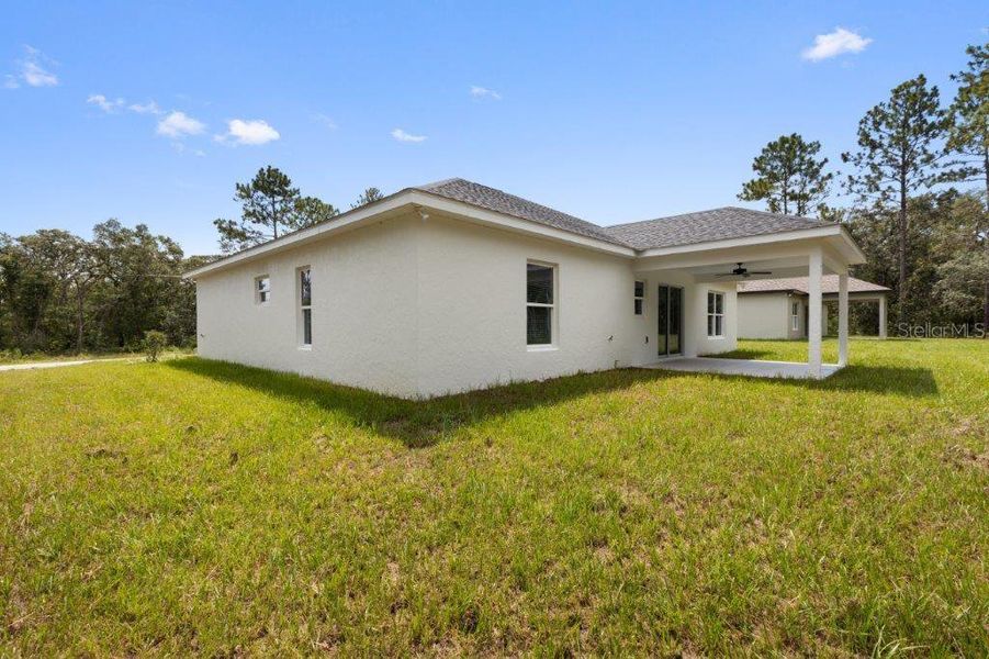 Exterior details and patio area of a home in , Citrus Springs (Image 19).