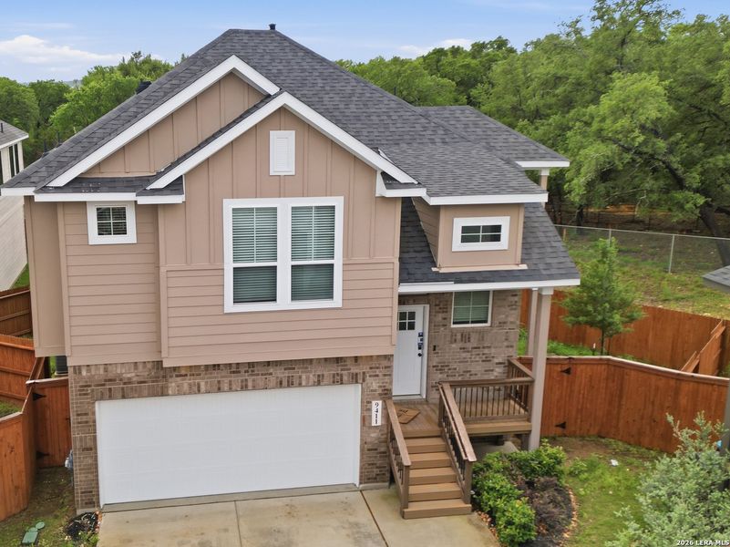 Front exterior of a new home in Stillwater Ranch, San Antonio, TX, highlighting curb appeal (Image 22).