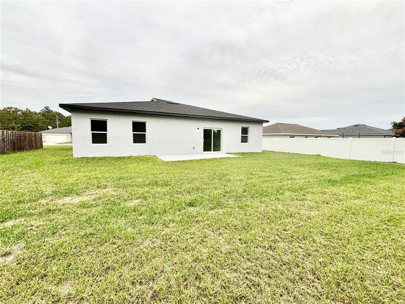 Exterior details and patio area of a home in , Ocala (Image 3).
