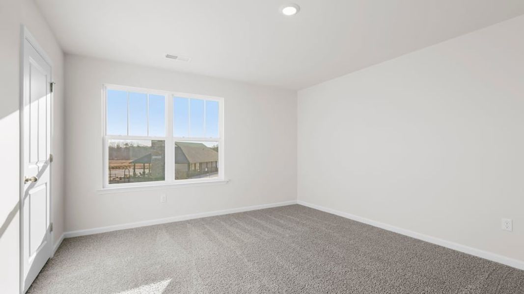 Spacious, unfurnished interior of a new home in Hunters Ridge, Woodruff (Image 24).