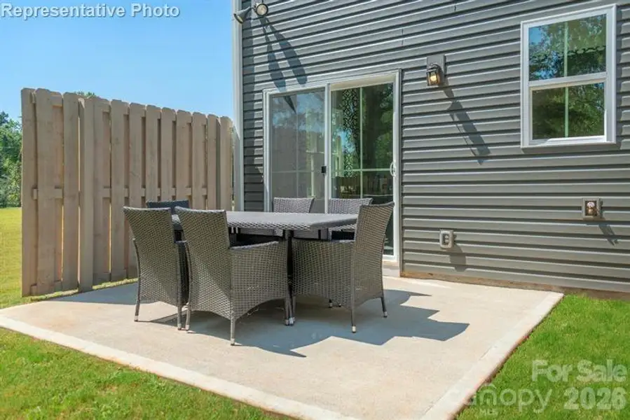 Fire up the grill! Enjoy BBQs, morning coffee, or evening chats on your spacious 10x12 back patio—your private outdoor escape! Fire up the grill! Enjoy BBQs, morning coffee, or evening chats on your spacious 10x12 back patio—your private outdoor escape!