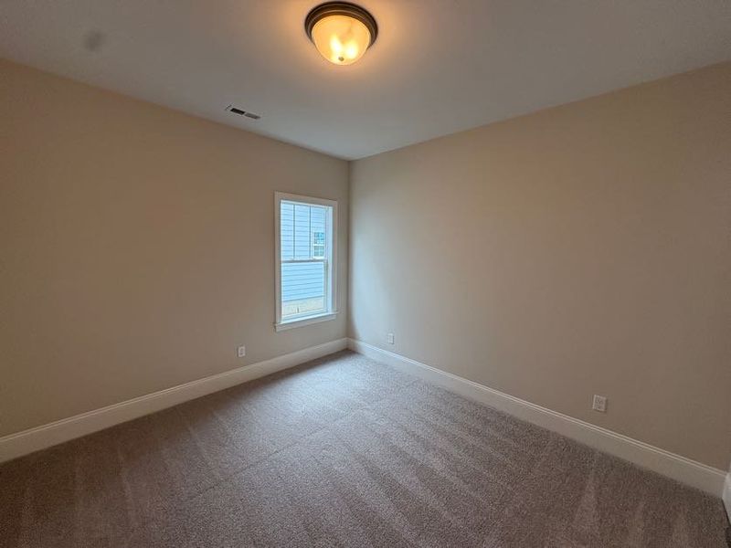 Spacious, unfurnished interior of a new home in Riverside Cove, Wilmington (Image 13).