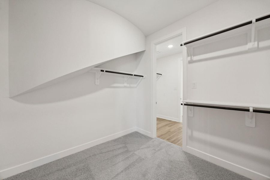 The second walk-in closet provides additional organized storage space, keeping everything neatly arranged and easily accessible. The second walk-in closet provides additional organized storage space, keeping everything neatly arranged and easily accessible.
