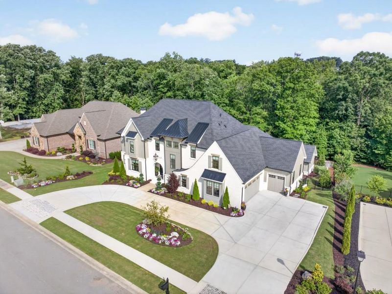 Front exterior of a new home in , Braselton, GA, highlighting curb appeal (Image 30).