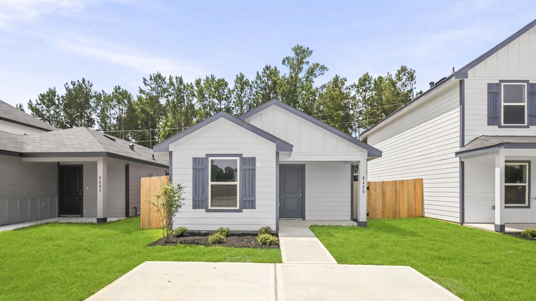 Front exterior of a new home in Gemini, Splendora, TX, highlighting curb appeal (Image 1). Front exterior of a new home in Gemini, Splendora, TX, highlighting curb appeal (Image 1).