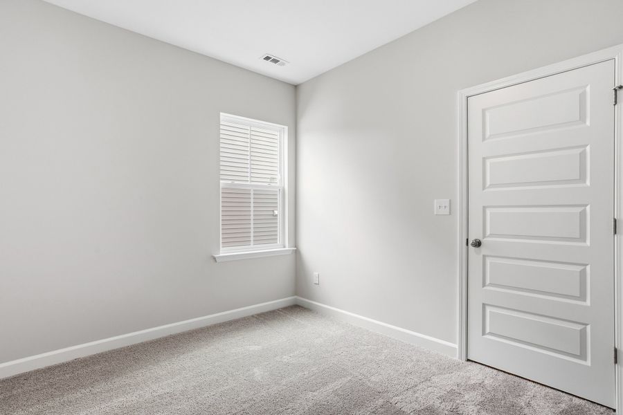 Spacious, unfurnished interior of a new home in Renaissance at White Oak, Garner (Image 24).