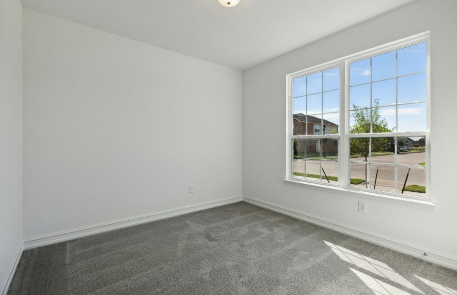 Spacious secondary bedroom with ample closet space