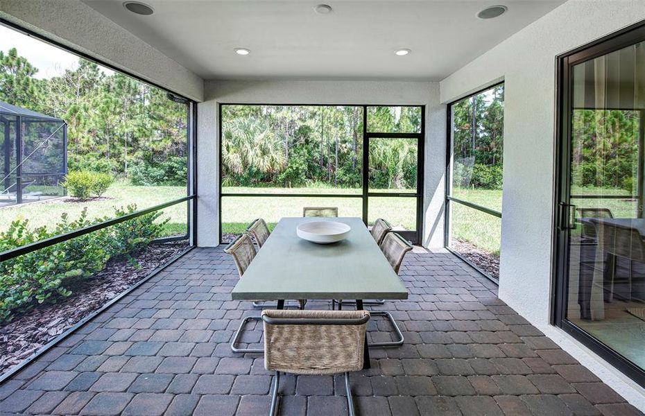 Exterior details and patio area of a home in The Strand at Cedar Grove, North Port (Image 22).