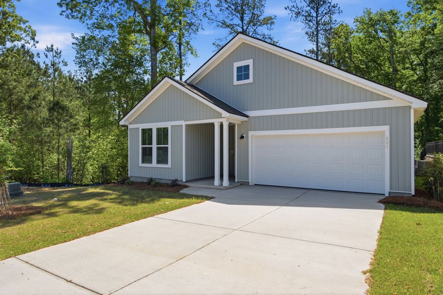 Front exterior of a new home in Grand Arbor, Blythewood, SC, highlighting curb appeal (Image 1). Front exterior of a new home in Grand Arbor, Blythewood, SC, highlighting curb appeal (Image 1).