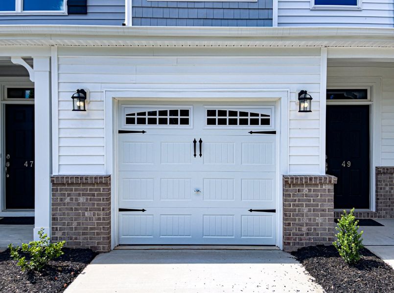 Front exterior of a new home in Fairview Village Townhomes, Simpsonville, SC, highlighting curb appeal (Image 2). Front exterior of a new home in Fairview Village Townhomes, Simpsonville, SC, highlighting curb appeal (Image 2).
