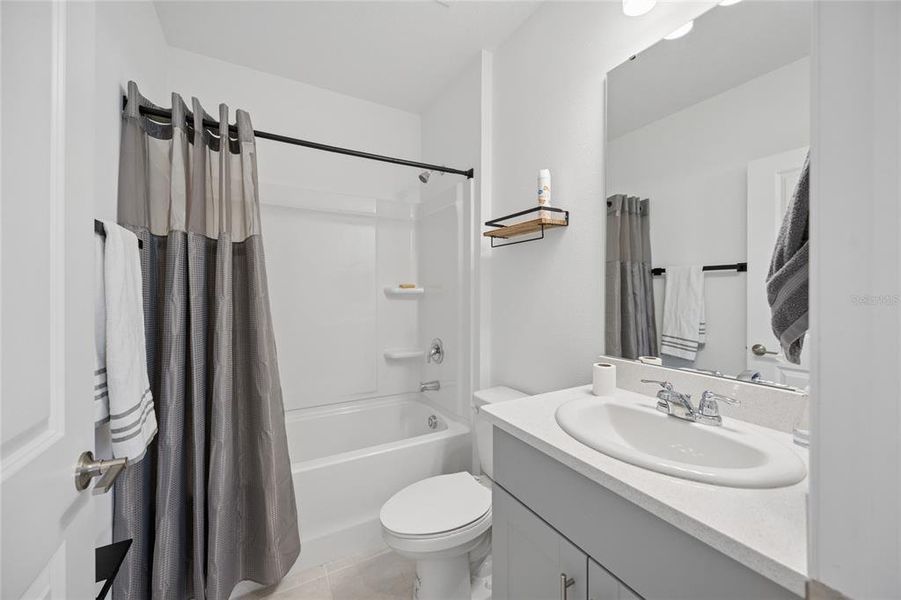 Furnished interior view inside a new home in Westview Community Group Page, Kissimmee (Image 5).