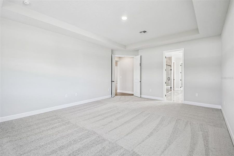 Spacious, unfurnished interior of a new home in Solace at Corner Lake, Orlando (Image 25).