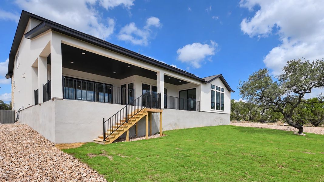 Exterior details and patio area of a home in The Preserve at Elm Creek, New Braunfels (Image 19).