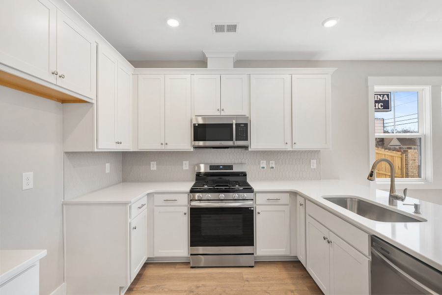 Representative furnished interior of a home built from the Holland by Hunter Quinn Homes in Renaissance Place, Greenville (Image 7).