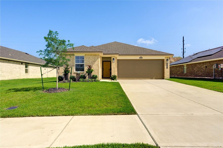 Front exterior of a new home in Palm Royal Estates, Baytown, TX, highlighting curb appeal (Image 1). Front exterior of a new home in Palm Royal Estates, Baytown, TX, highlighting curb appeal (Image 1).