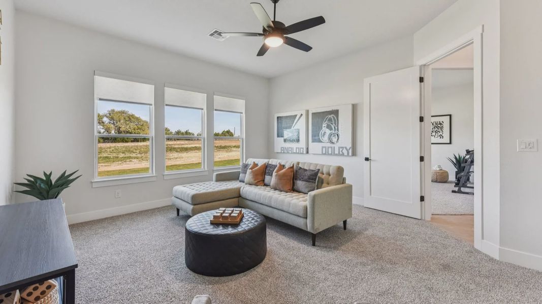 Representative furnished interior of a home built from the Garet by Chesmar Homes in Feathergrass, Florence (Image 29).