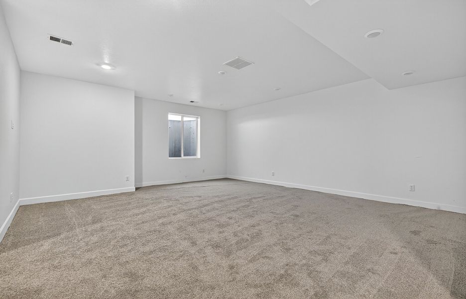 Spacious, unfurnished interior of a new home in Trailstone, Arvada (Image 23).