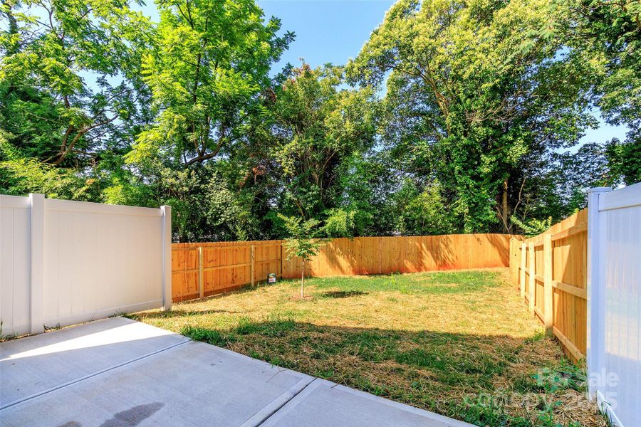 Front exterior of a new home in , Charlotte, NC, highlighting curb appeal (Image 7).