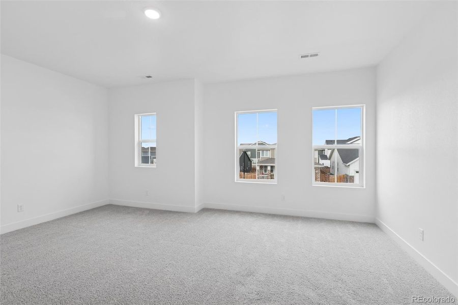 Spacious, unfurnished interior of a new home in Painted Prairie Cottage, Aurora (Image 19).