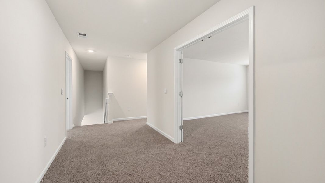 Spacious, unfurnished interior of a new home in Brooks Station, Dacula (Image 21).