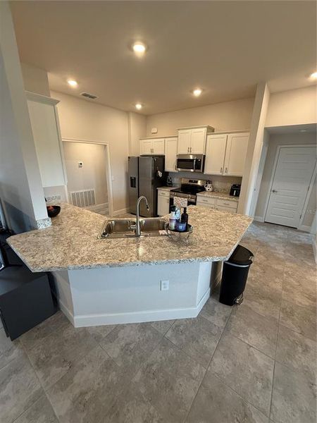 Furnished interior view inside a new home in Cadence Crossing, Auburndale (Image 13).