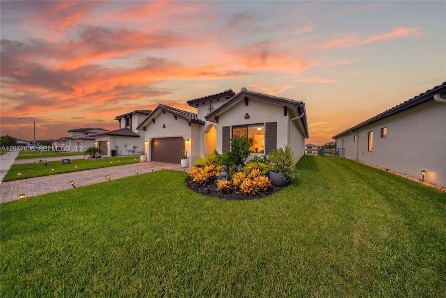 Front exterior of a new home in , Immokalee, FL, highlighting curb appeal (Image 30).