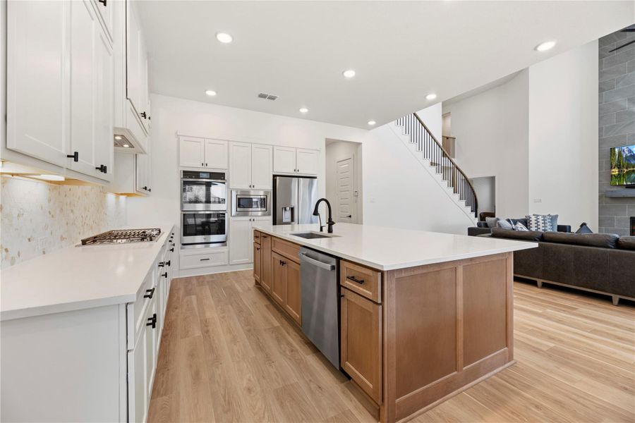 Furnished interior view inside a new home in Bridgeland, Cypress (Image 16).