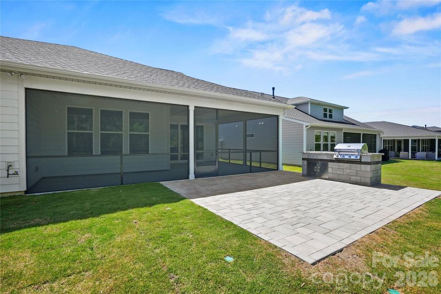 Exterior details and patio area of a home in Carolina Riverside, Belmont (Image 4).