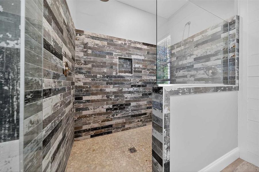 Bathroom featuring a walk in shower