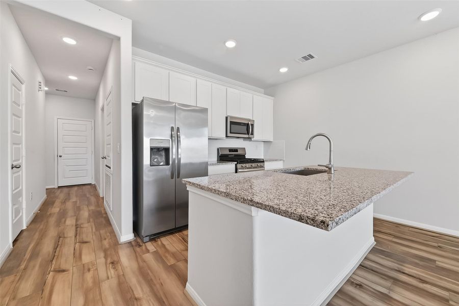 Furnished interior view inside a new home in , Magnolia (Image 12). Furnished interior view inside a new home in , Magnolia (Image 12).