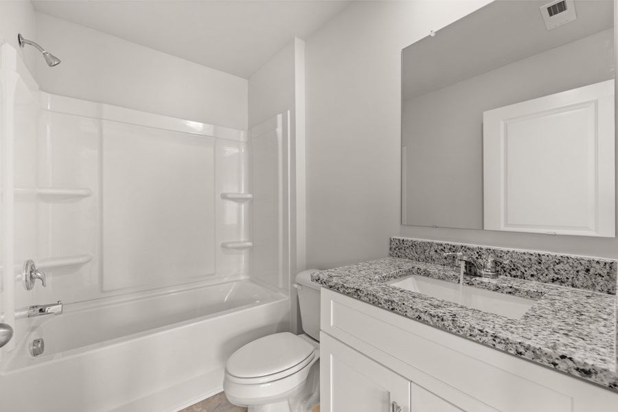 Representative furnished interior of a home built from the Mansfield by D.R. Horton in Southwind Village, Evans (Image 14).