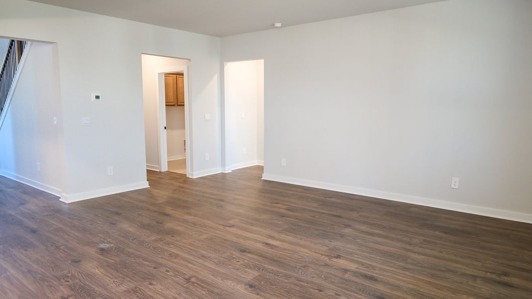 Representative unfurnished interior of a home built from the STONEBROOK II by D.R. Horton in Harvest Point, Spring Hill (Image 37).