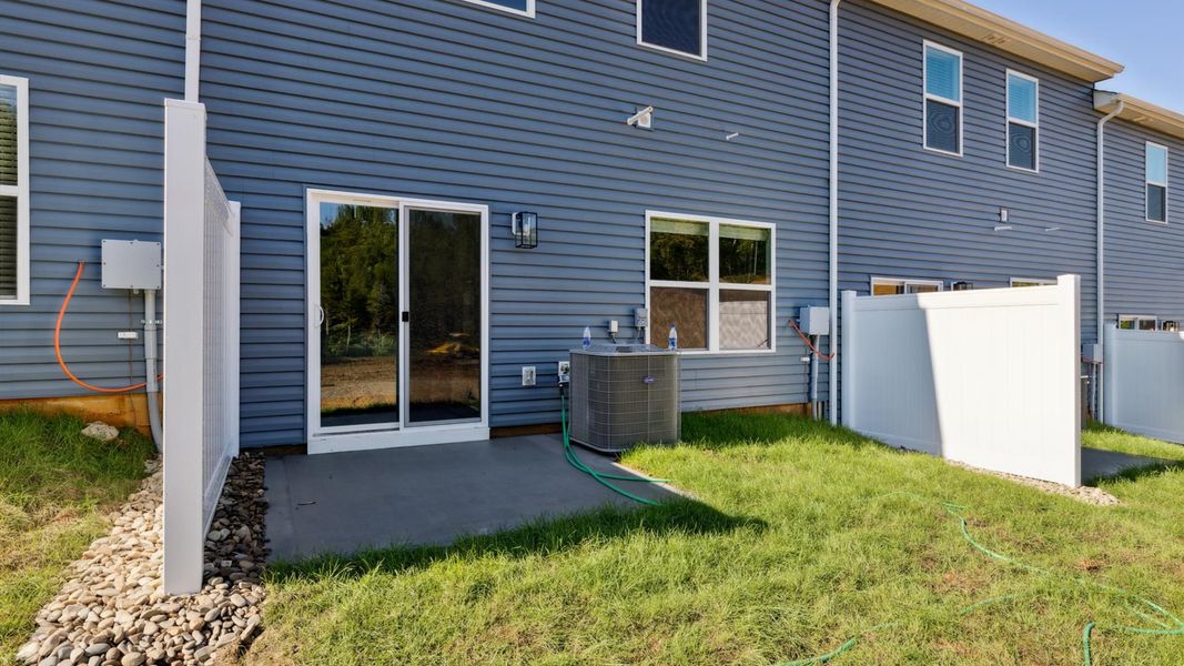 Exterior details and patio area of a home in Cherokee Crossing, Kodak (Image 1).