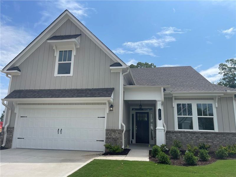 Front exterior of a new home in , Gainesville, GA, highlighting curb appeal (Image 2). Front exterior of a new home in , Gainesville, GA, highlighting curb appeal (Image 2).