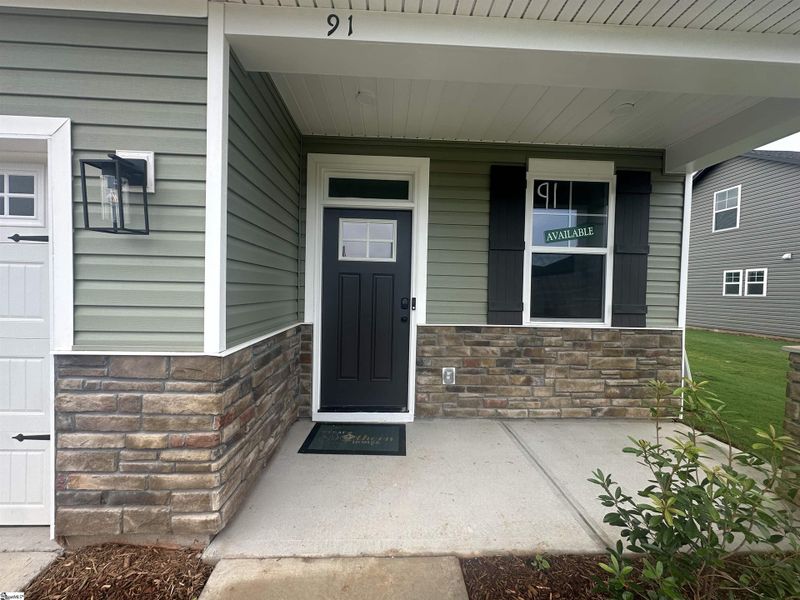 Front exterior of a new home in Shiloh Trail, Wellford, SC, highlighting curb appeal (Image 20).