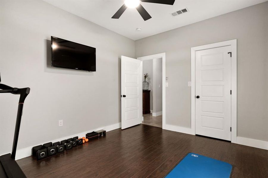 Alternate View of Secondary Bedroom looking towards entry and walk in closet.