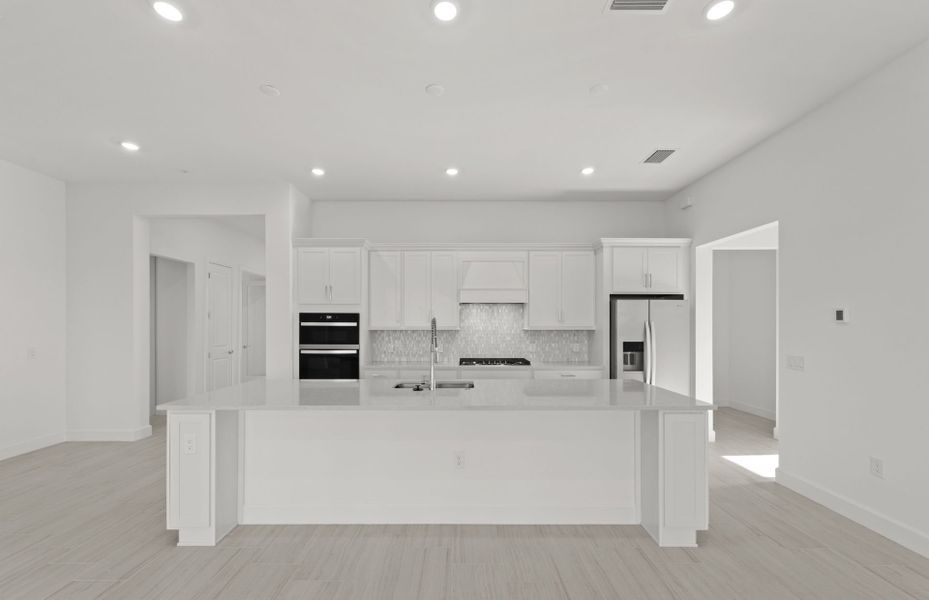 Furnished interior view inside a new home in TerraWalk at Babcock Ranch, Alva (Image 7).