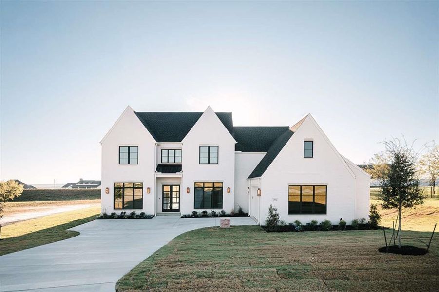 Front exterior of a new home in , Fort Worth, TX, highlighting curb appeal (Image 1). Front exterior of a new home in , Fort Worth, TX, highlighting curb appeal (Image 1).