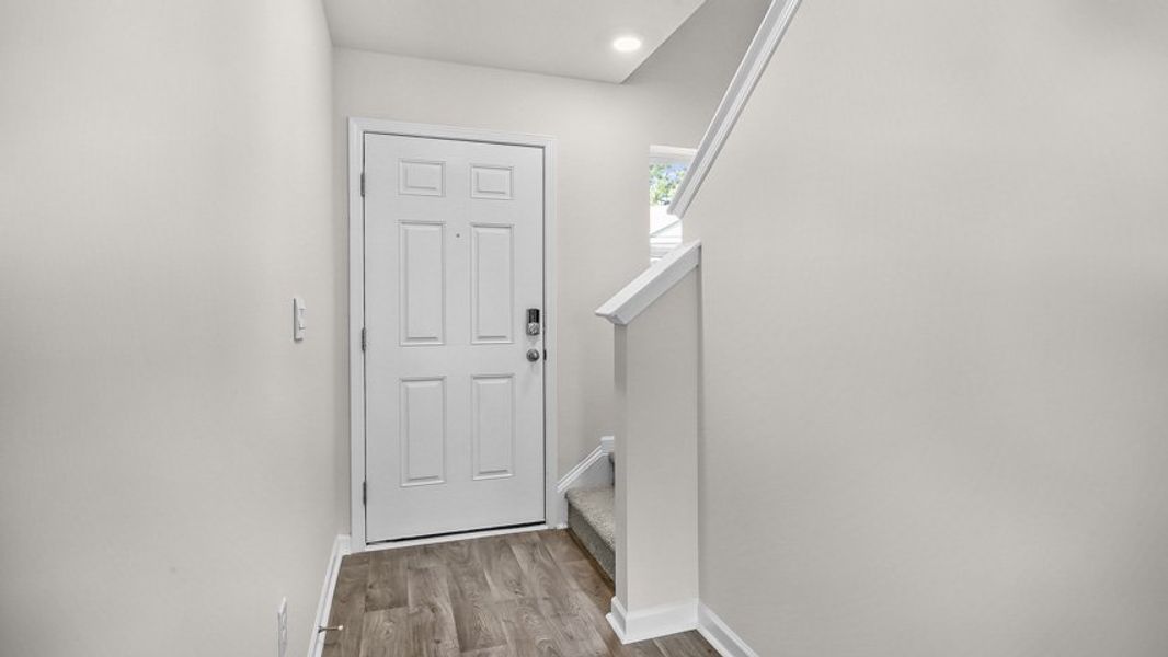 Spacious, unfurnished interior of a new home in Edinborough Townes, Gibsonville (Image 8).