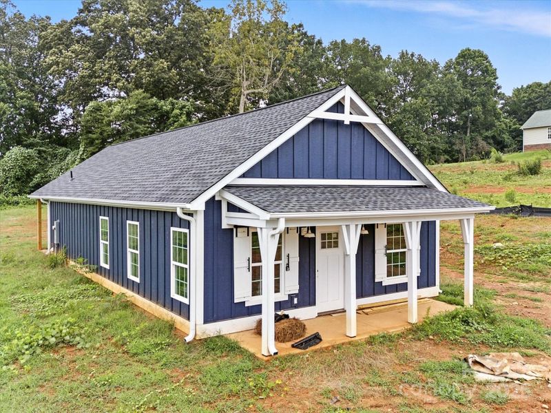 Front exterior of a new home in , Clover, SC, highlighting curb appeal (Image 20).