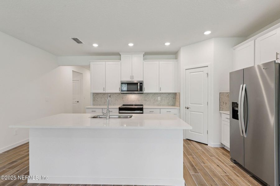 Furnished interior view inside a new home in Colbert Landings, Palm Coast (Image 4).