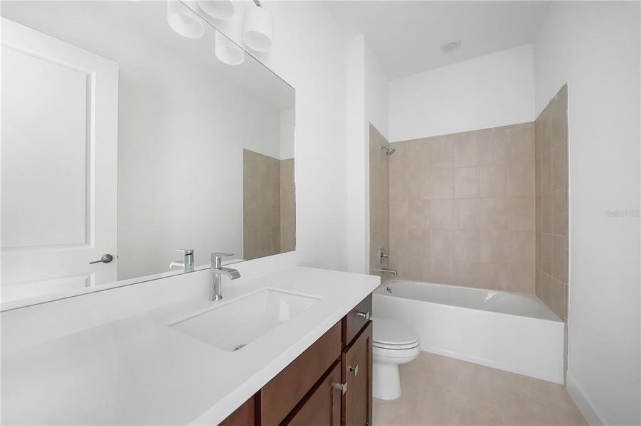 Furnished interior view inside a new home in Esplanade at Skye Ranch, Sarasota (Image 28).