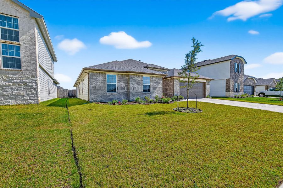 Exterior details and patio area of a home in Windstone on the Prairie, Richmond (Image 21).