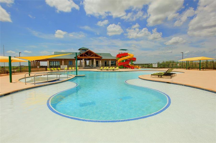 View of swimming pool featuring a patio and a water slide