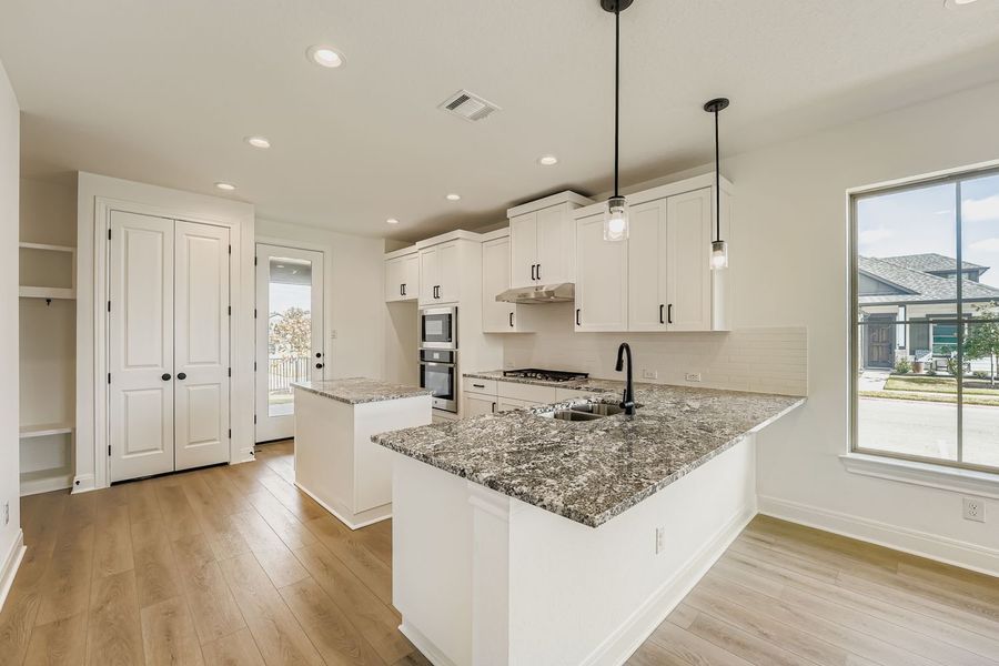Furnished interior view inside a new home in The Porch at Du Pre, Buda (Image 7).