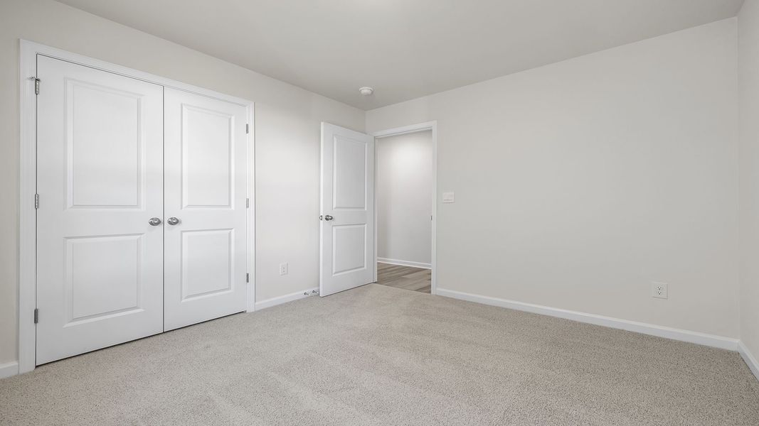 Spacious, unfurnished interior of a new home in Village Grove, Greenville (Image 19).