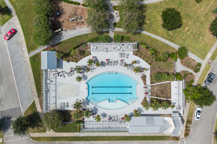 Front exterior of a new home in Sweetgrass at Summers Corner: Arbor Collection, Summerville, SC, highlighting curb appeal (Image 20). Front exterior of a new home in Sweetgrass at Summers Corner: Arbor Collection, Summerville, SC, highlighting curb appeal (Image 20).