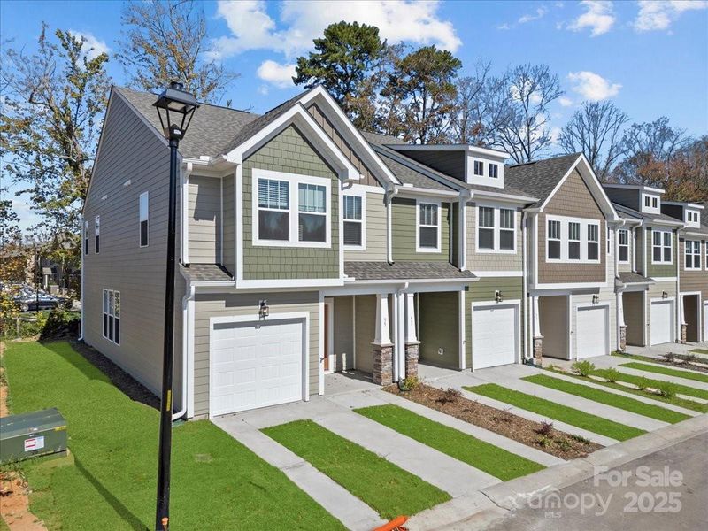 Front exterior of a new home in Clayton Crossing, Arden, NC, highlighting curb appeal (Image 2). Front exterior of a new home in Clayton Crossing, Arden, NC, highlighting curb appeal (Image 2).